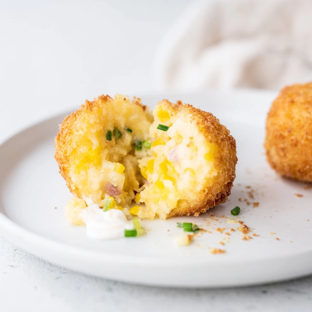 Fried Mashed Potato Balls golden-crisp exterior, creamy cheddar center, served with ranch.