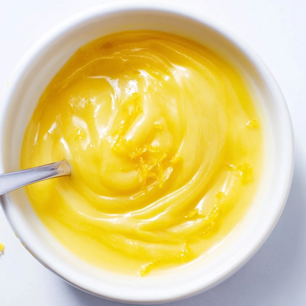 Homemade Lemon Curd Recipe cooling in jar, silky texture, tangy sweetness.