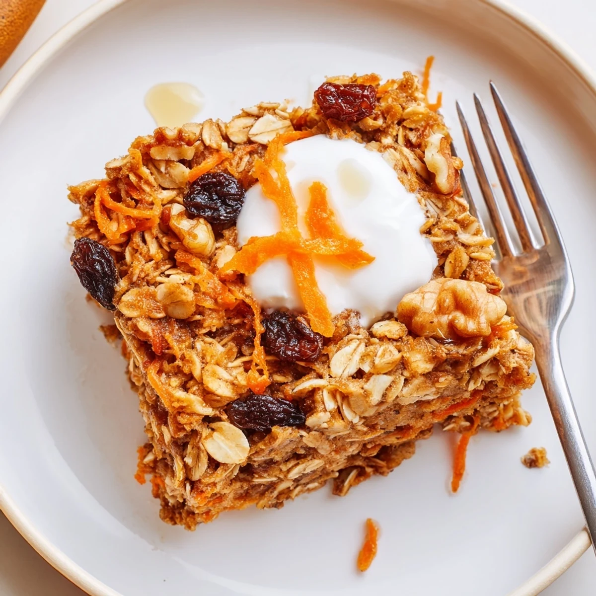 Warm Carrot Cake Baked Oatmeal fresh from the oven, cinnamon aroma, yogurt dollop
